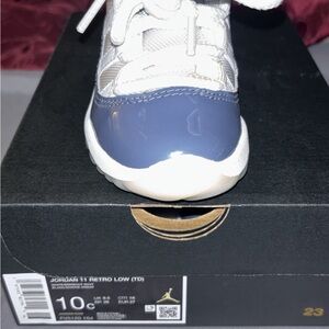 Jordan White and Blue Sneakers Classic Athletic Design